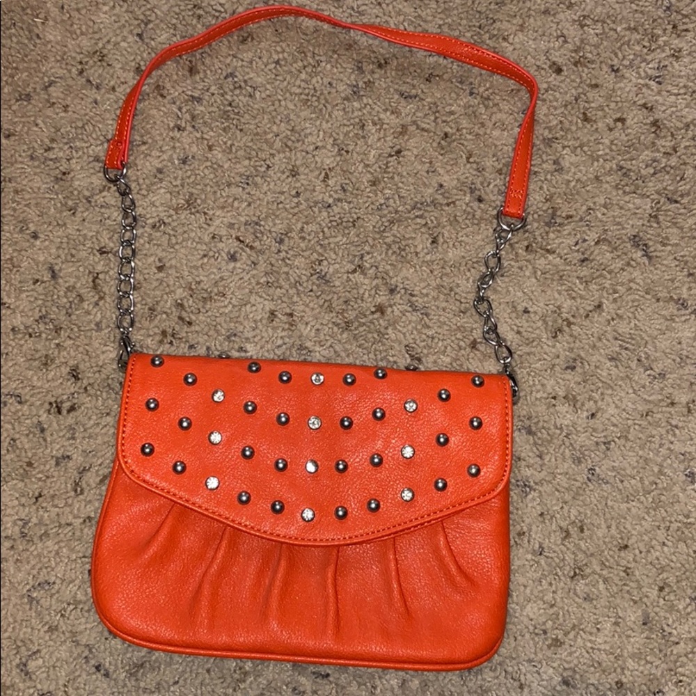 Clutch with strap